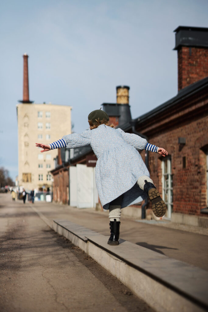 Girl balances wool socks
